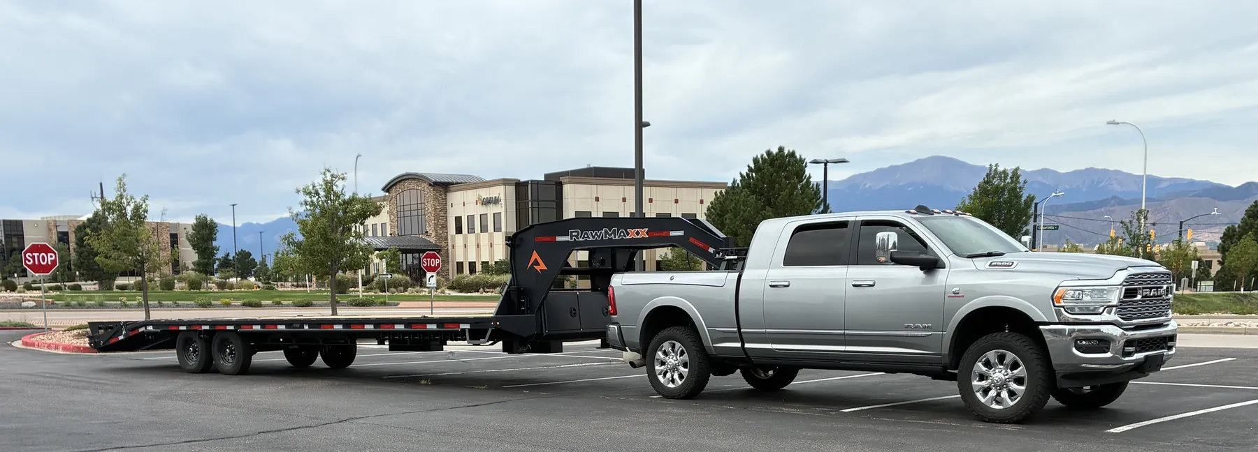 E3 Logistics hotshot truck and gooseneck trailer serving Aurora, Colorado