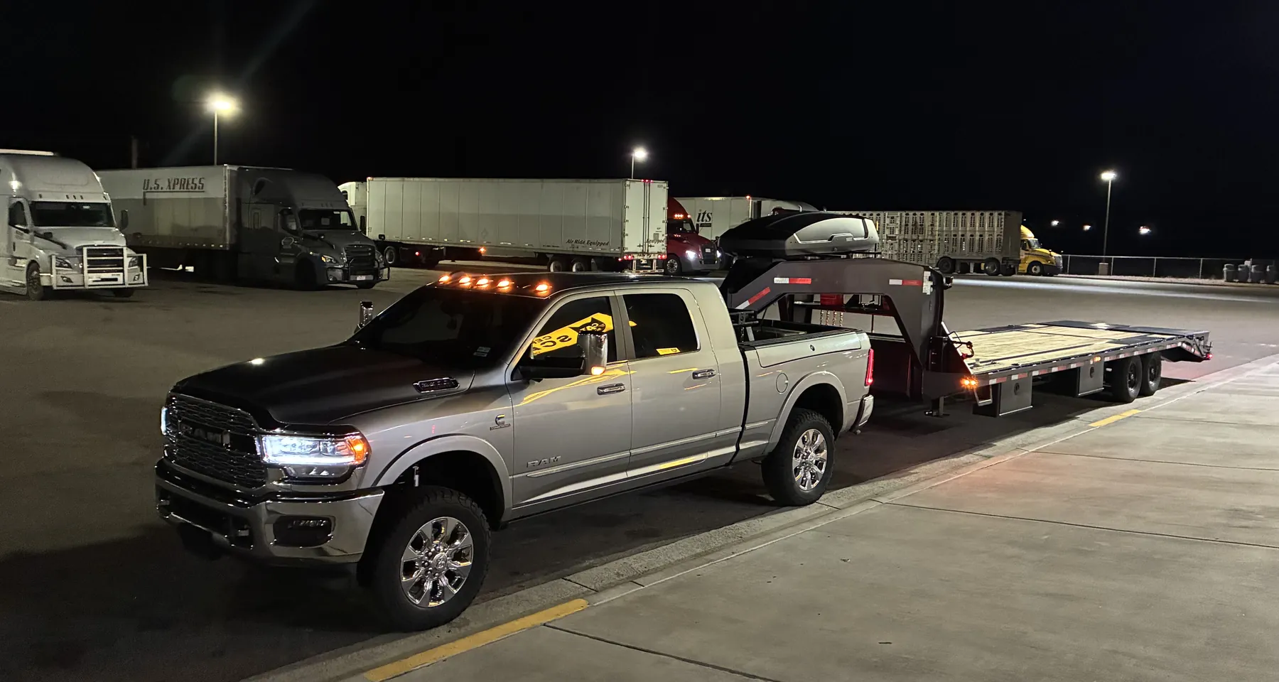 E3 Logistics hotshot truck and gooseneck trailer serving Boulder, Colorado